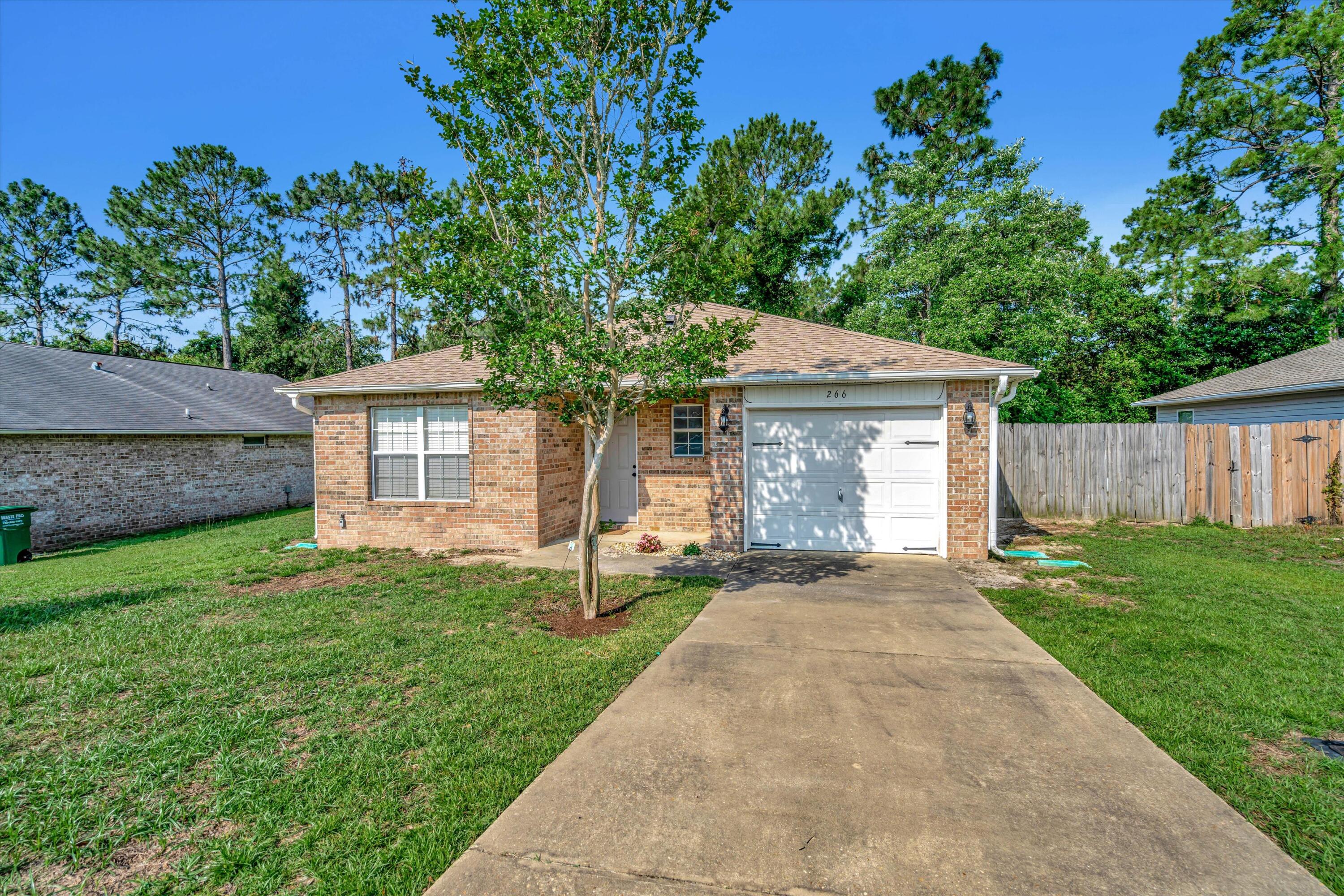 266 Limestone Circle Crestview, FL 32539 - Photo 1 of 25 front view of a house with a yard