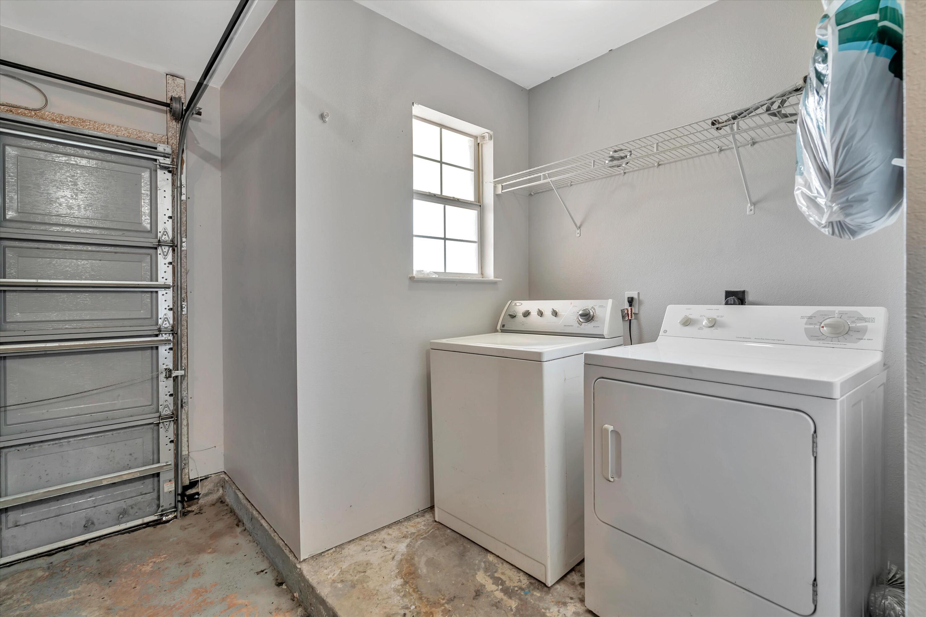 266 Limestone Circle Crestview, FL 32539 - Photo 22 of 25 a utility room with dryer and washer