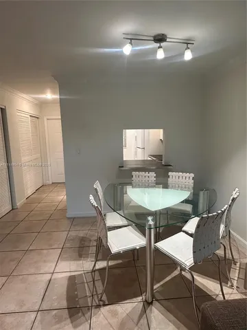 a view of a kitchen area with furniture