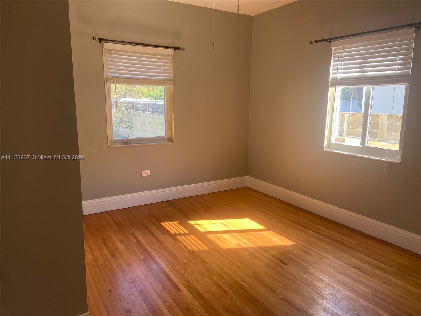 155 Southwest 28th Road Miami, FL 33129 - Photo 21 of 33 an empty room with a window