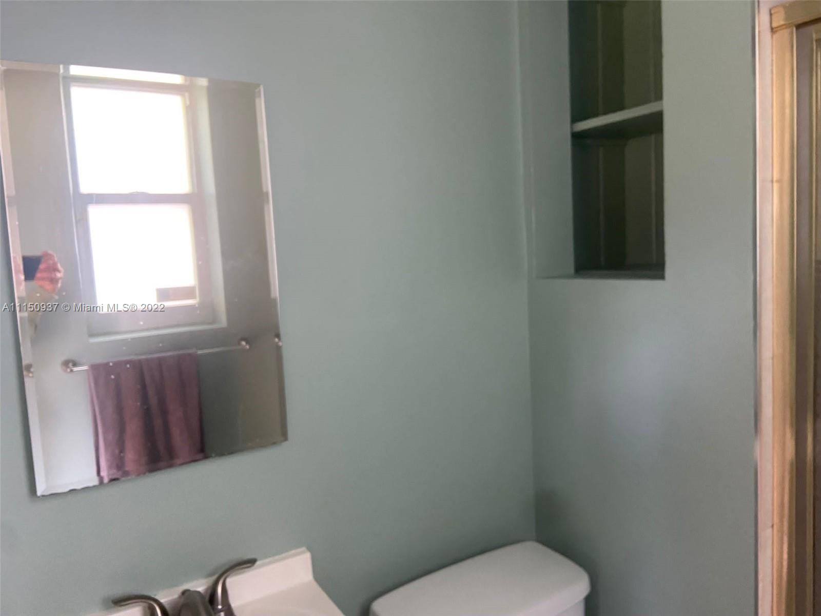 155 Southwest 28th Road Miami, FL 33129 - Photo 27 of 33 a bathroom with a toilet