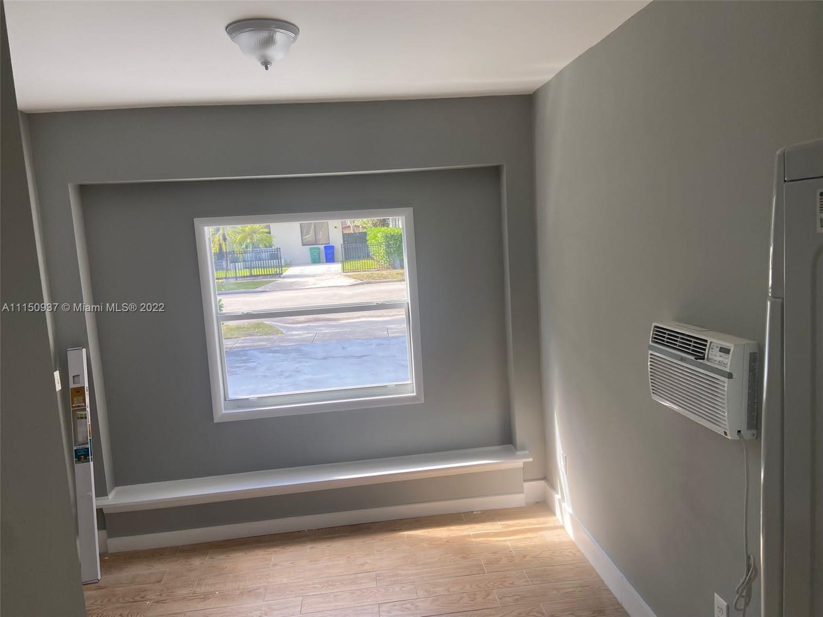 155 Southwest 28th Road Miami, FL 33129 - Photo 30 of 33 a view of an empty room with a window