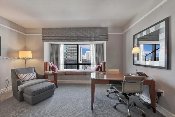 a room with furniture and a window