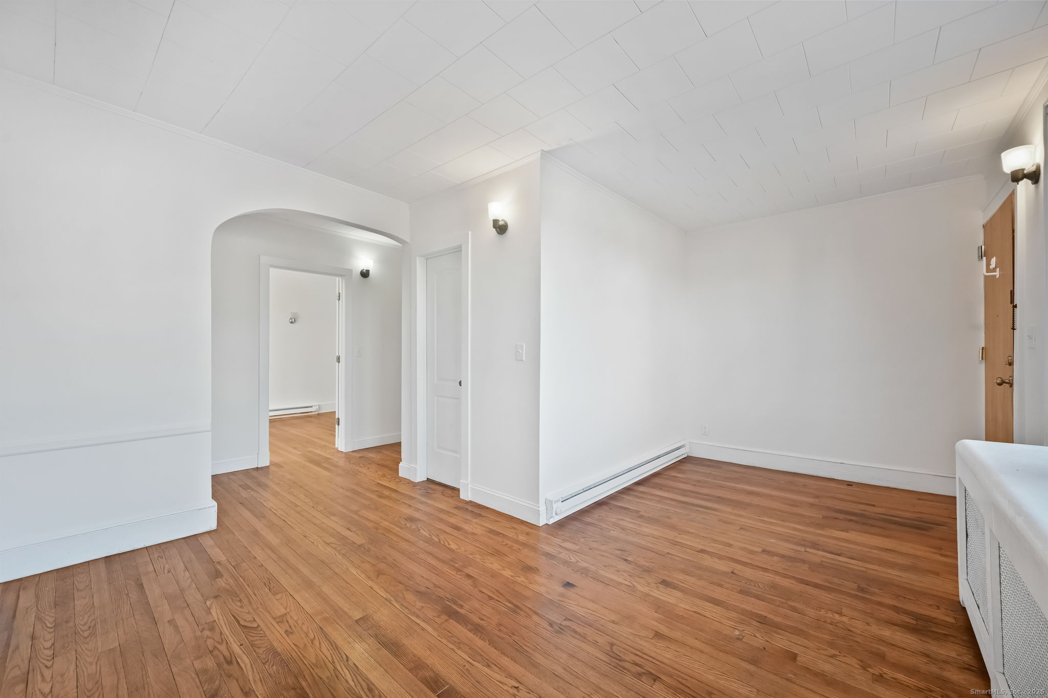 8 Smith Street, Unit 1 Danbury, CT 06810 - Photo 2 of 23 a view of a room with wooden floor