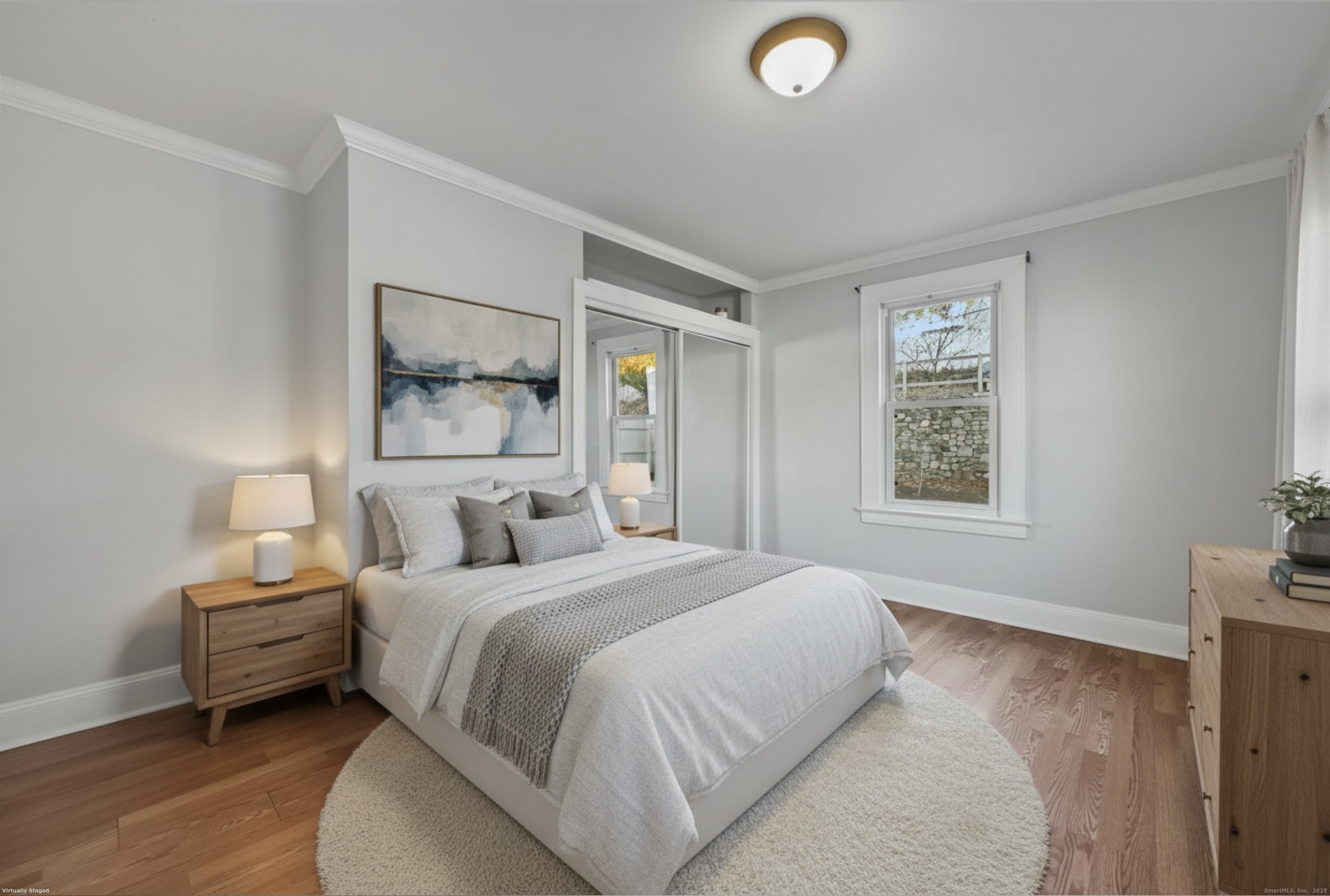 8 Smith Street, Unit 1 Danbury, CT 06810 - Photo 22 of 23 a bedroom with a bed and a window