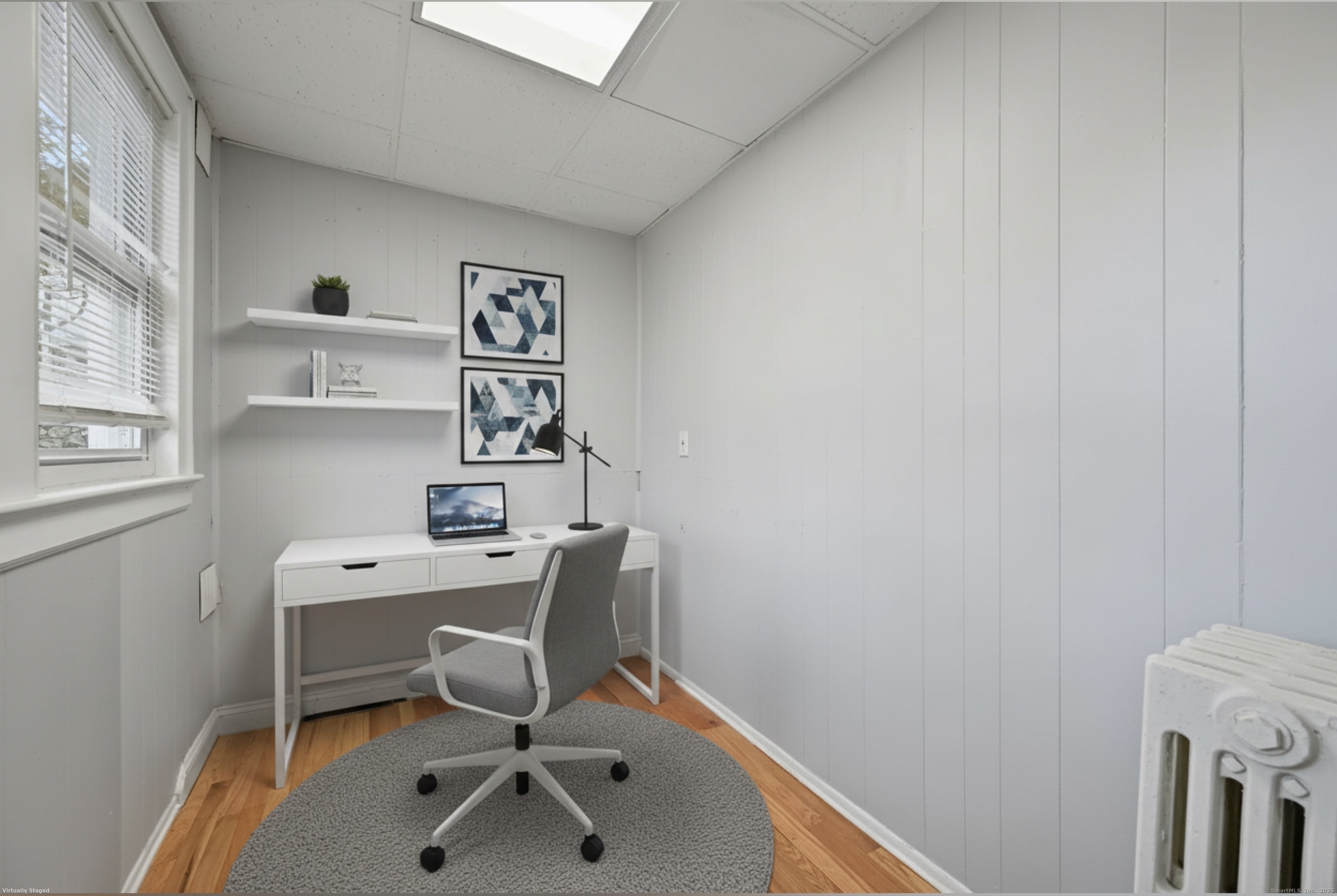 8 Smith Street, Unit 1 Danbury, CT 06810 - Photo 23 of 23 a view of a workspace with furniture and a window