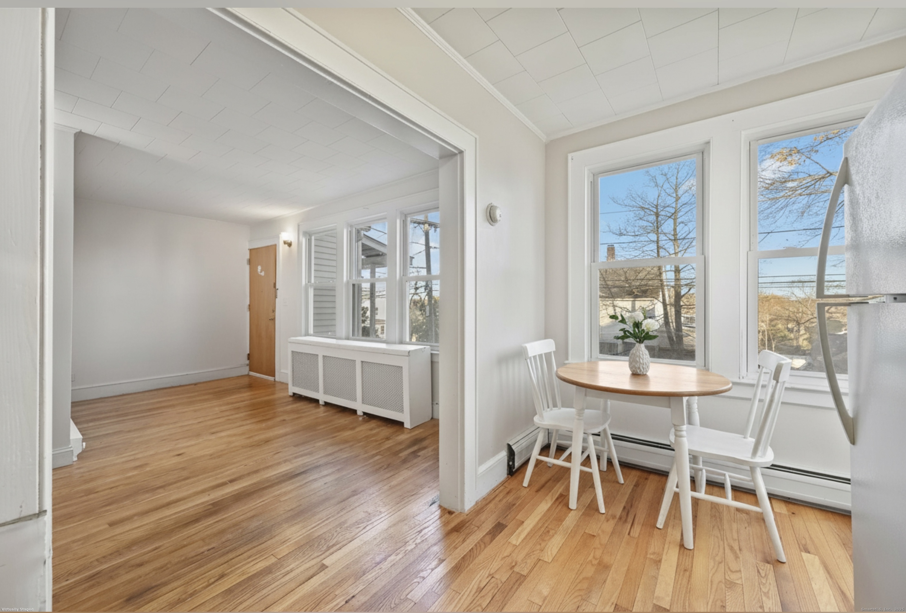 8 Smith Street, Unit 1 Danbury, CT 06810 - Photo 5 of 23 a view of a dining room with furniture and wooden floor