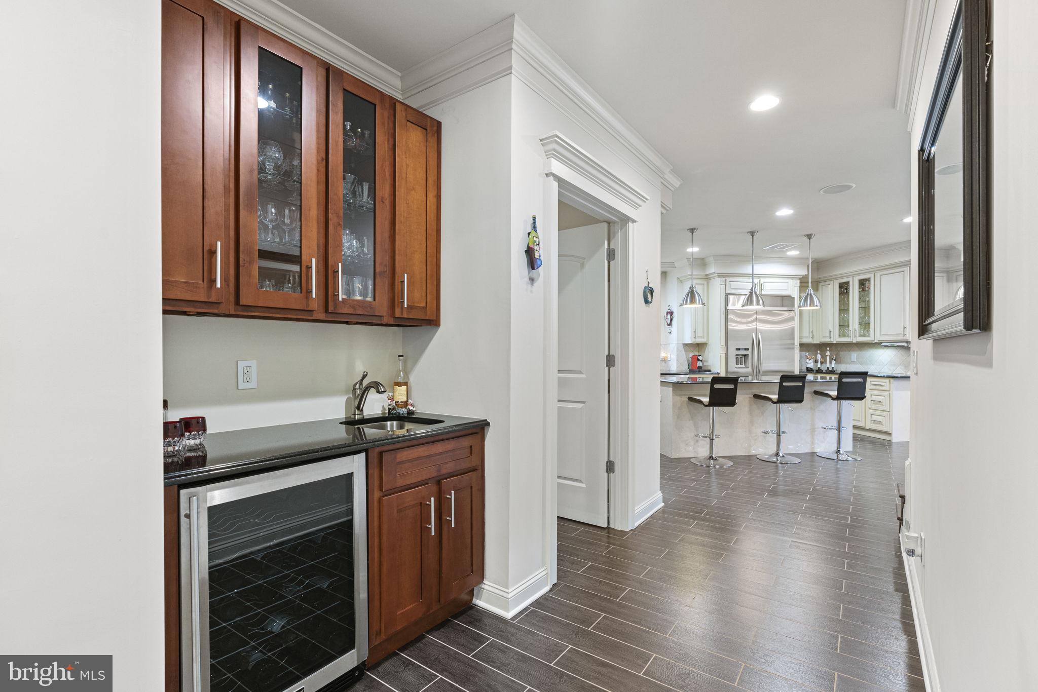 1204 Allendale Road McLean, VA 22101 - Photo 14 of 62 a kitchen with stainless steel appliances granite countertop a stove and a refrigerator