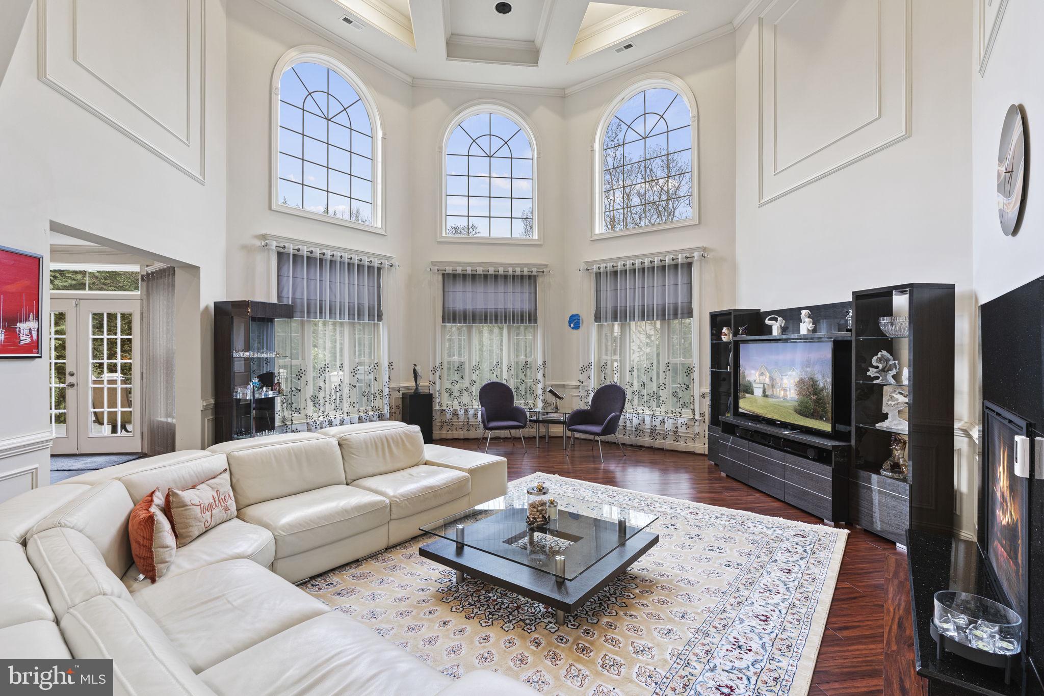 1204 Allendale Road McLean, VA 22101 - Photo 17 of 62 a living room with furniture fireplace and flat screen tv