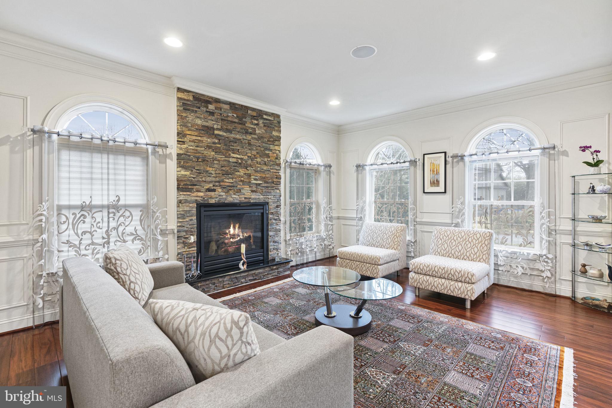 1204 Allendale Road McLean, VA 22101 - Photo 22 of 62 a living room with furniture and a fireplace
