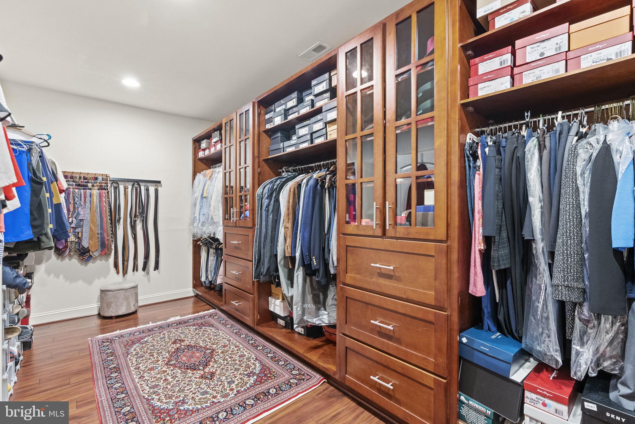 1204 Allendale Road McLean, VA 22101 - Photo 32 of 62 a view of walk in closet with clothes and shoes