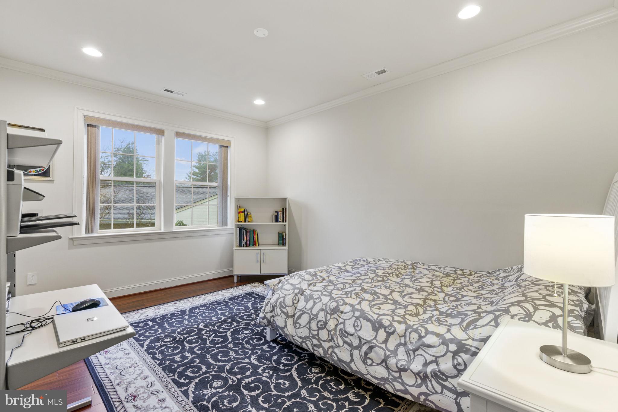 1204 Allendale Road McLean, VA 22101 - Photo 38 of 62 a bedroom with a bed and wooden floor