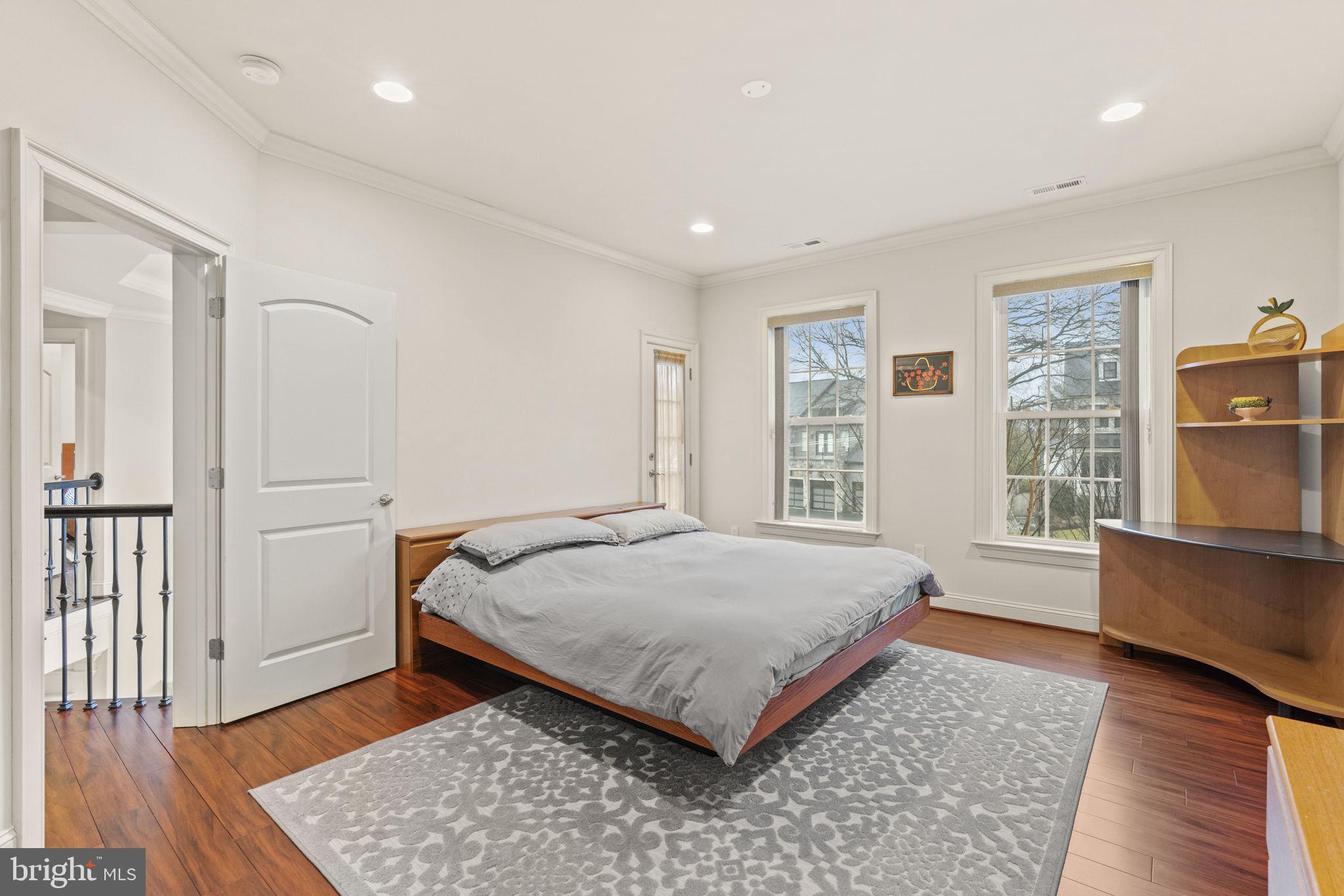 1204 Allendale Road McLean, VA 22101 - Photo 44 of 62 a bedroom with a bed and wooden floor