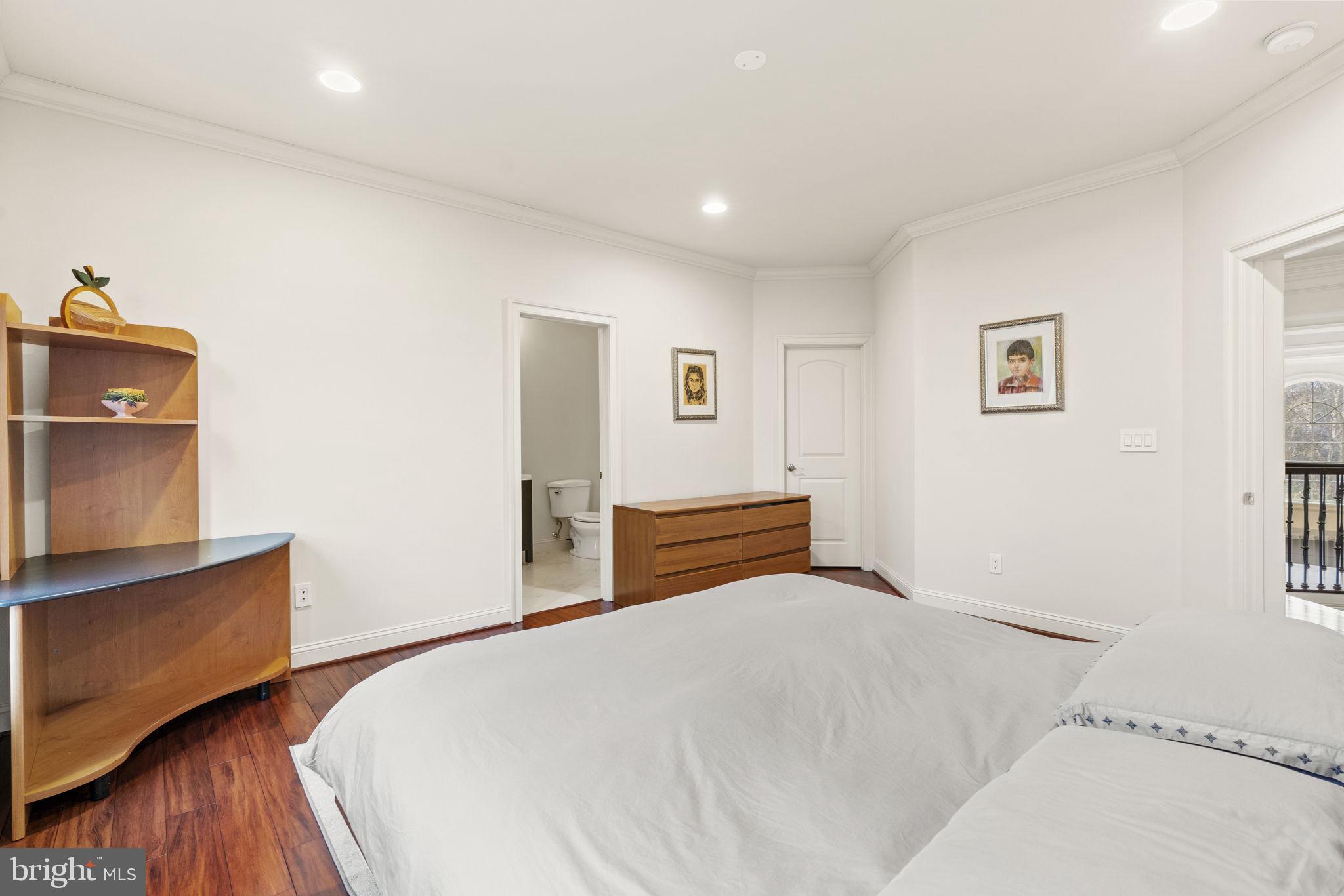 1204 Allendale Road McLean, VA 22101 - Photo 45 of 62 a bedroom with a bed and wooden floor