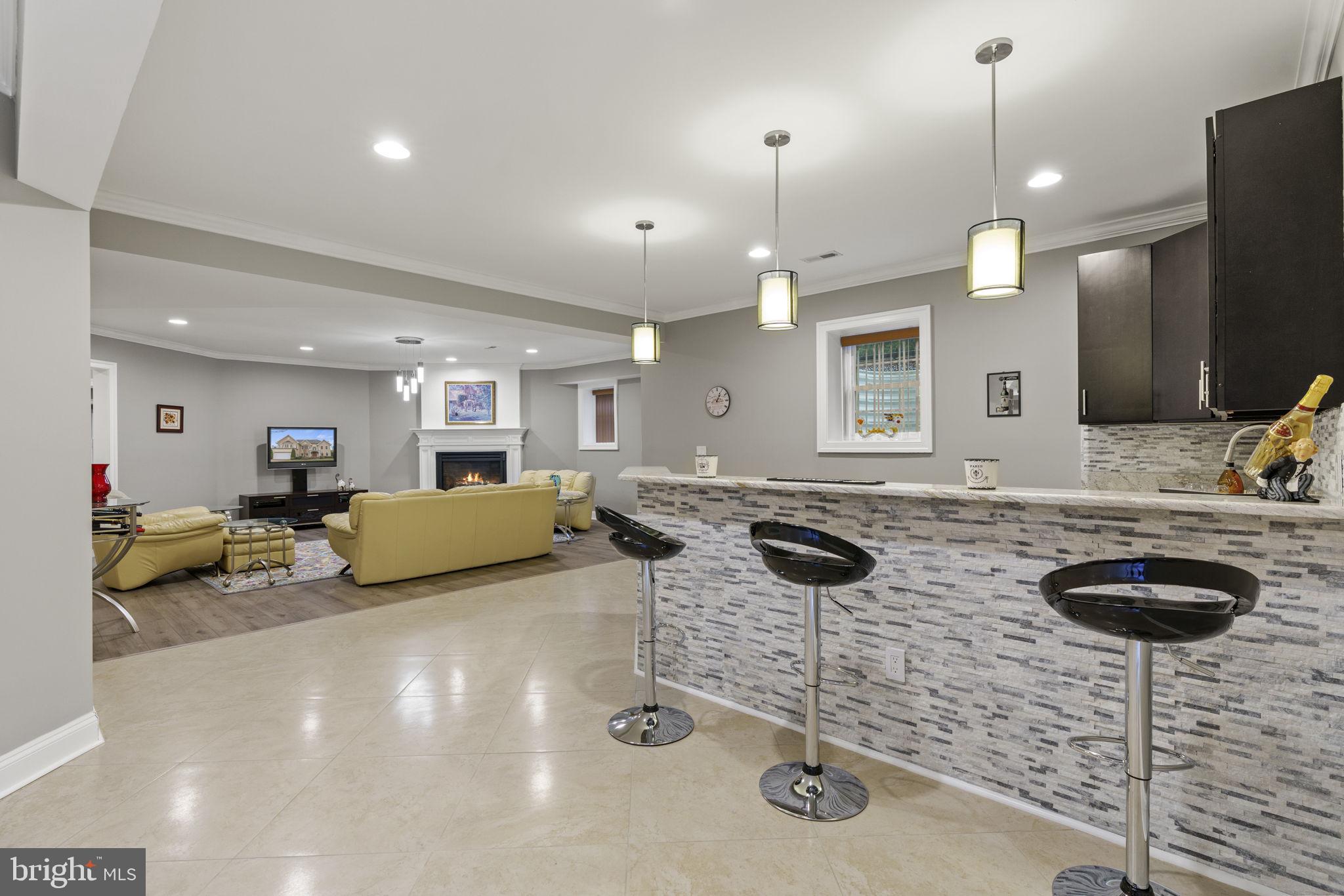 1204 Allendale Road McLean, VA 22101 - Photo 47 of 62 a room with lots of chairs and mirrors