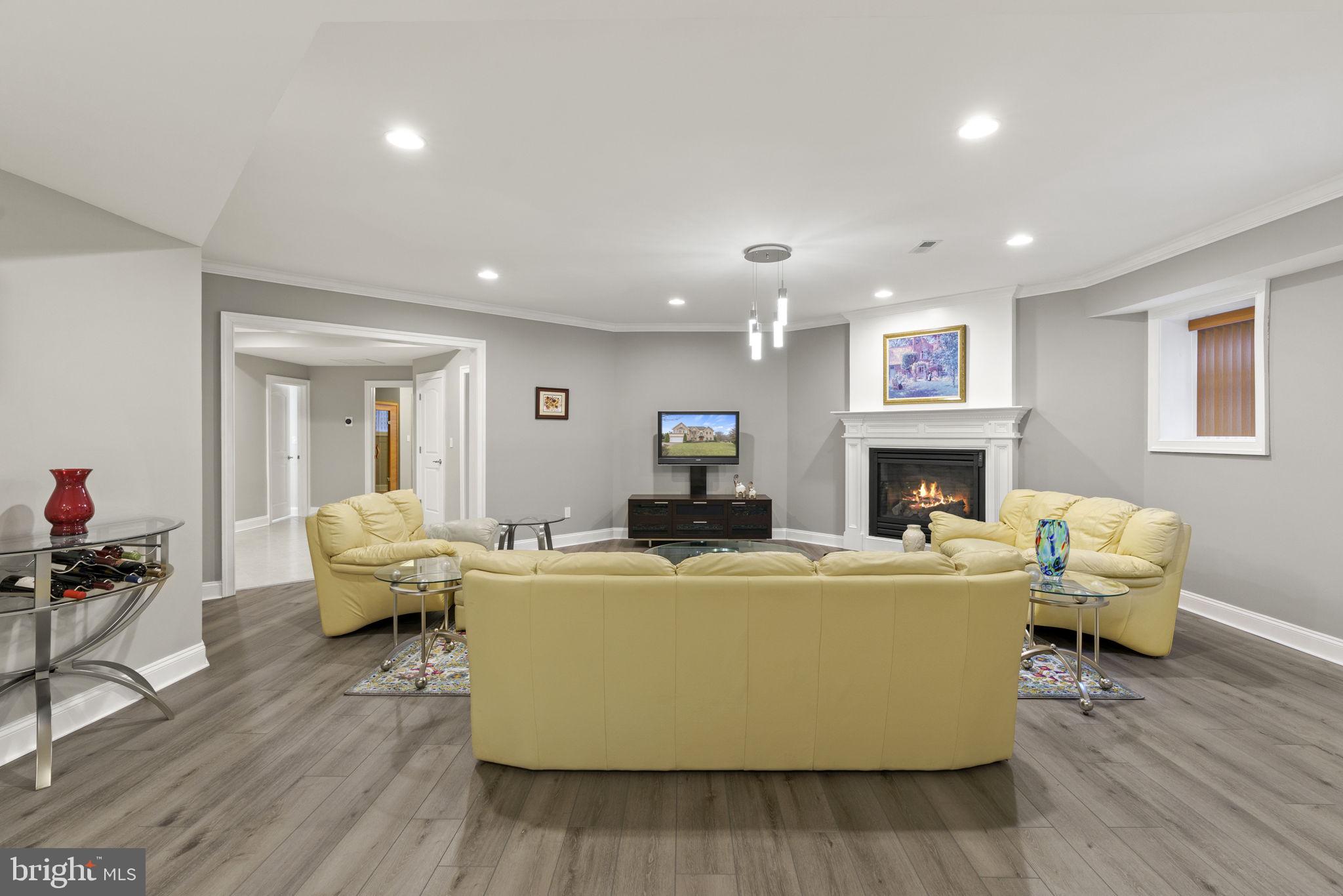 1204 Allendale Road McLean, VA 22101 - Photo 48 of 62 a living room with furniture and a fireplace