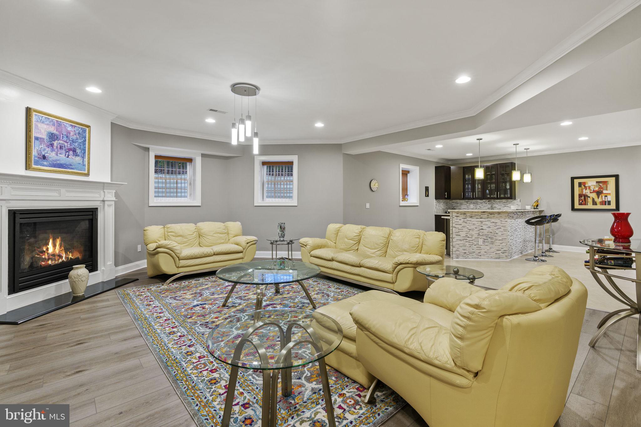 1204 Allendale Road McLean, VA 22101 - Photo 49 of 62 a living room with furniture and a fireplace