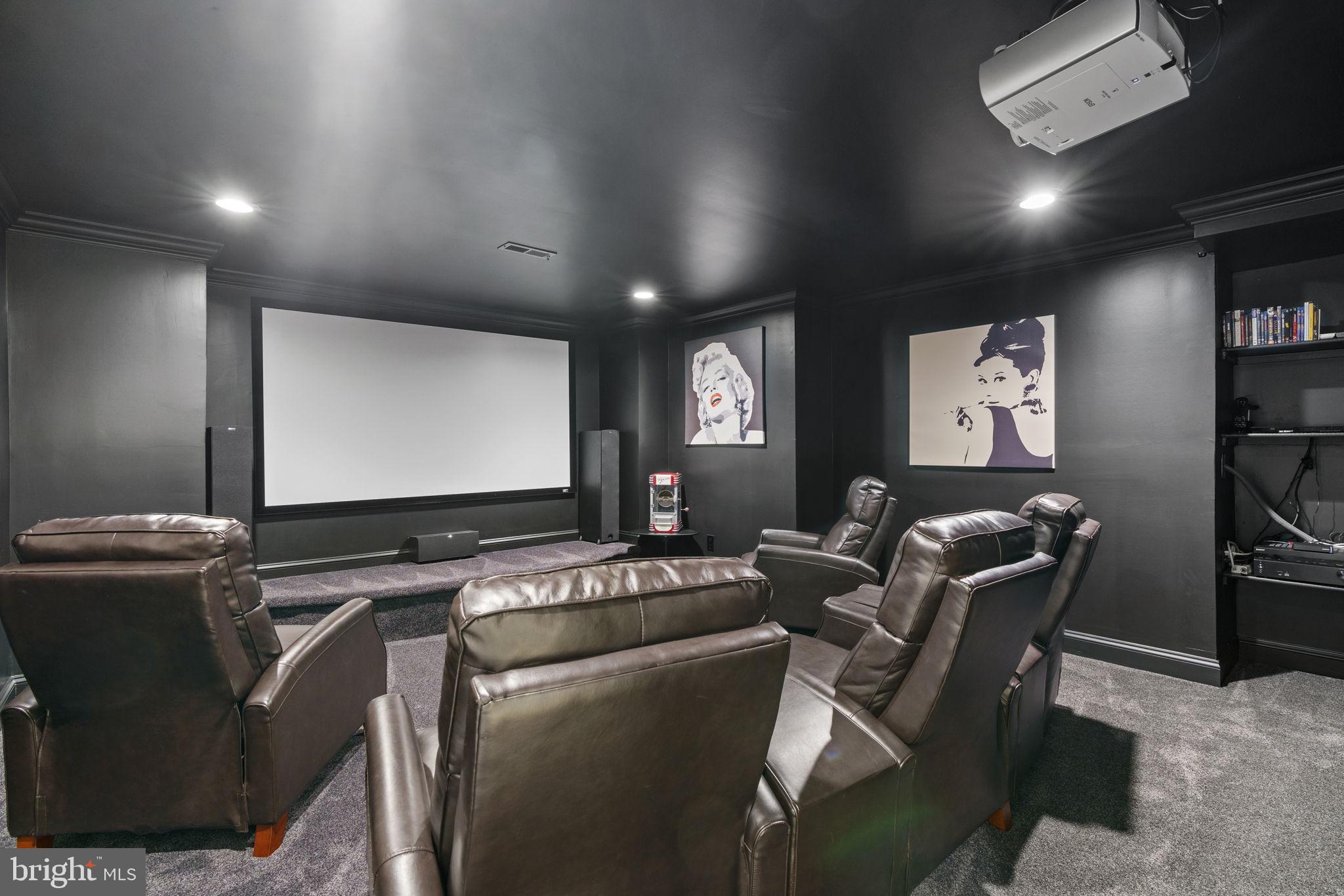 1204 Allendale Road McLean, VA 22101 - Photo 52 of 62 a projector room with furniture a projector and screen