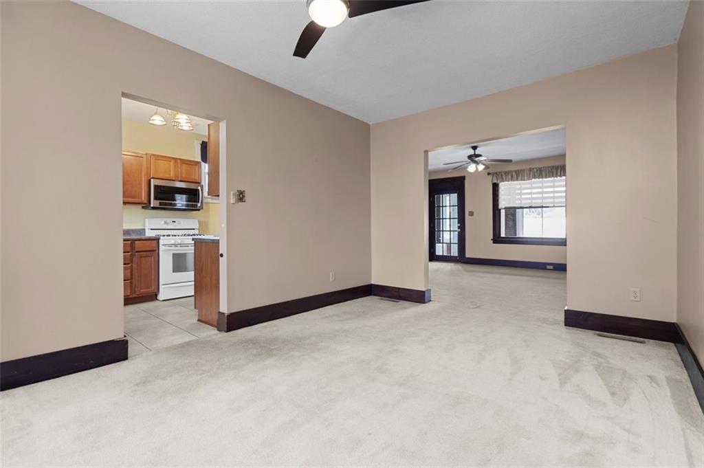 11 Butler Street Pittsburgh, PA 15209 - Photo 12 of 29 a view of a big room with windows and cabinet
