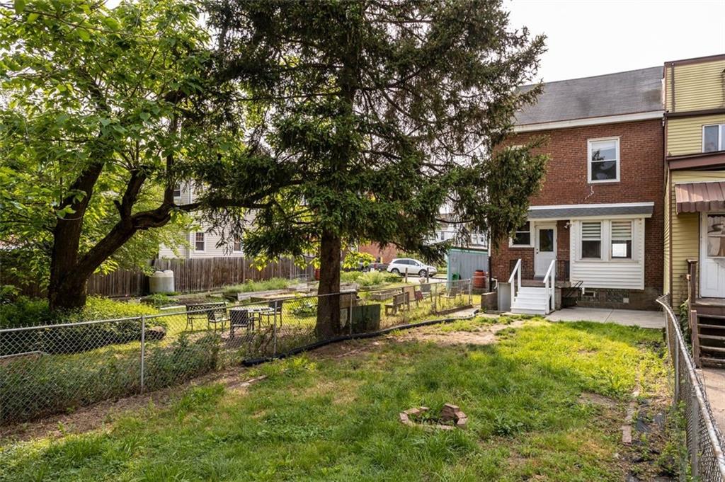 11 Butler Street Pittsburgh, PA 15209 - Photo 3 of 29 front view of a house with a yard