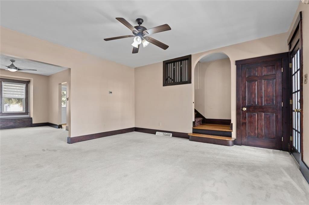 11 Butler Street Pittsburgh, PA 15209 - Photo 9 of 29 a view of an empty room with a ceiling fan