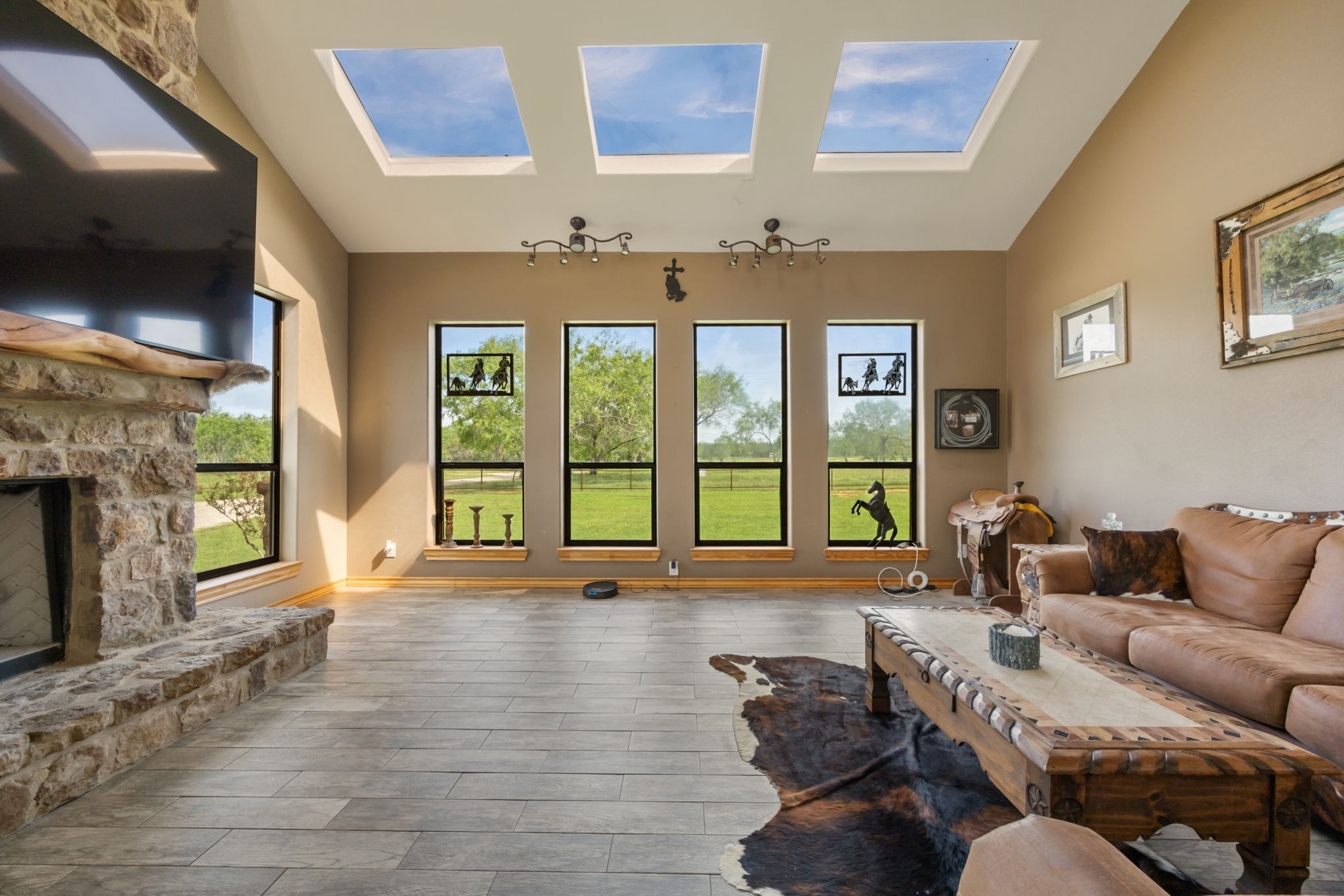 11970 Sulphur Springs Road Adkins, TX 78101 - Photo 10 of 50 Skylights and large windows invite the natural light into the main living area in the home