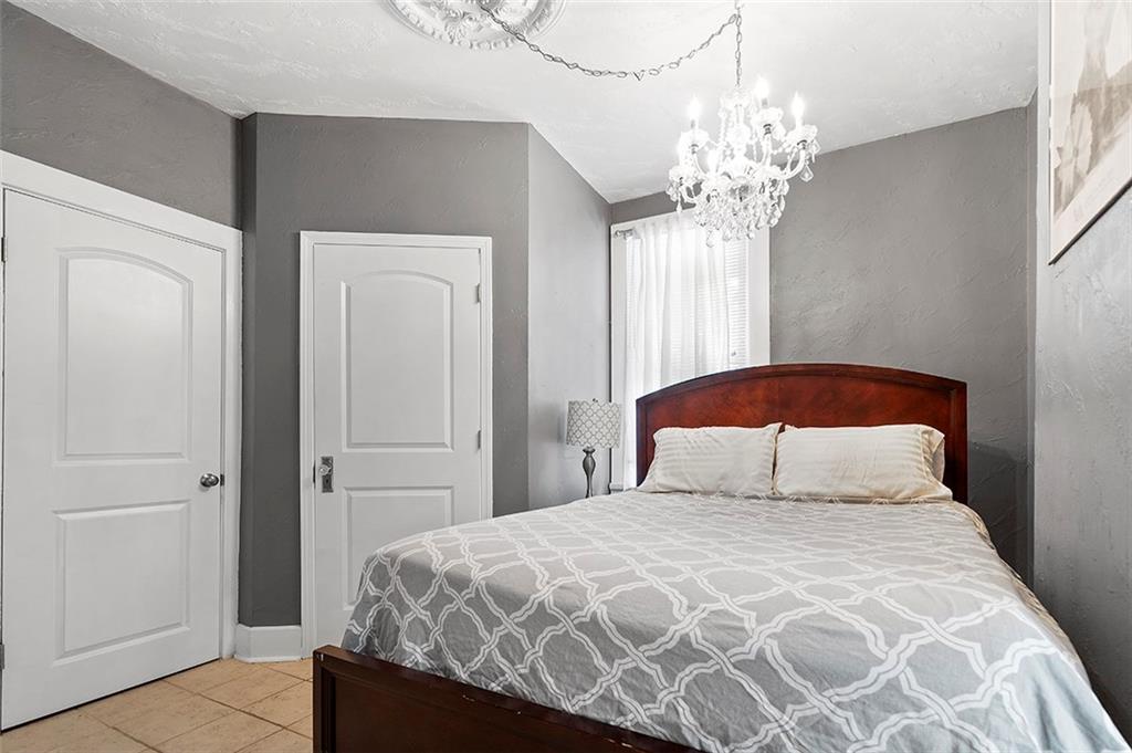 2 Bevington Road Pittsburgh, PA 15221 - Photo 9 of 25 First floor master bedroom with access to full bath.