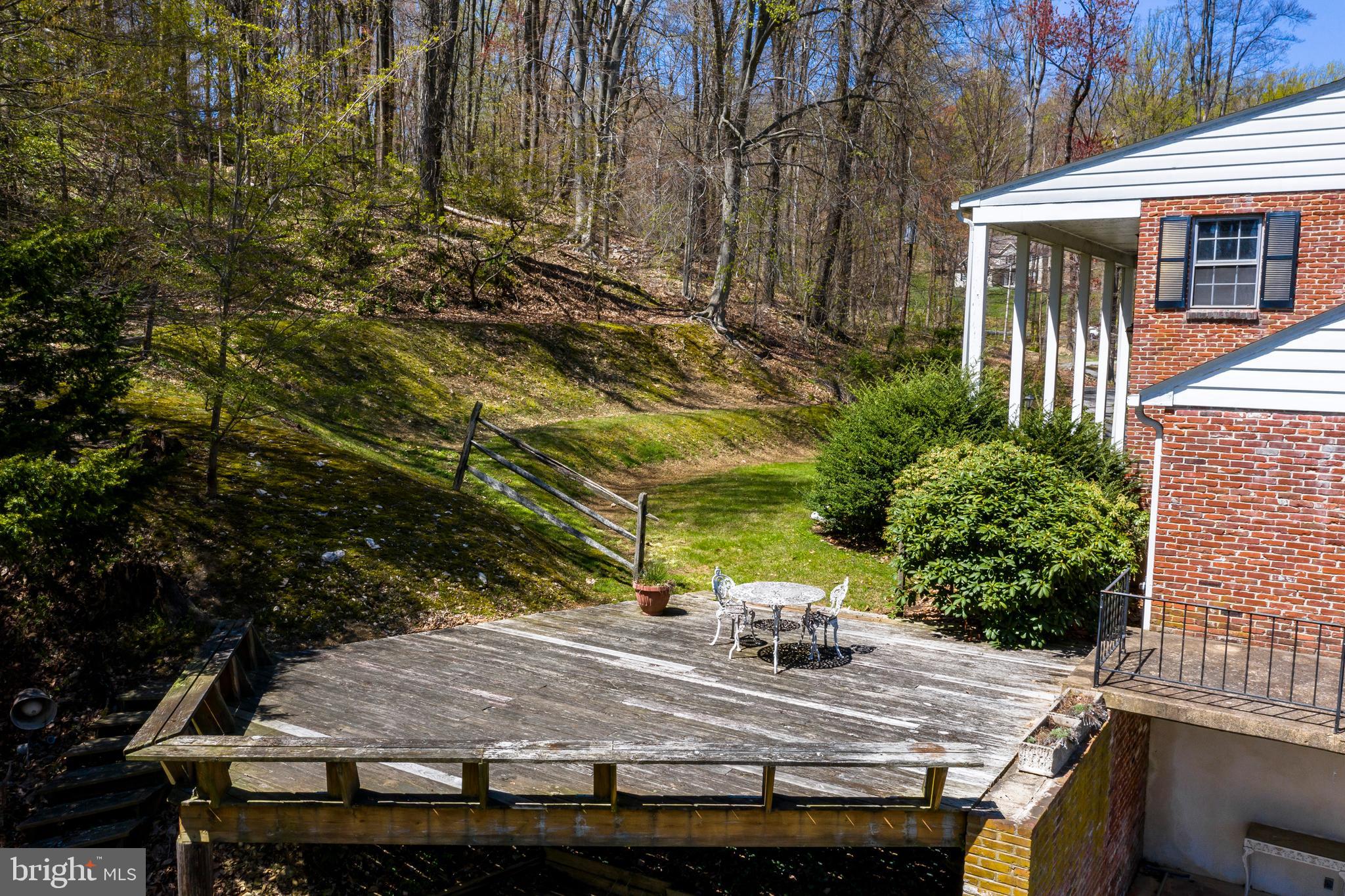 108 Township Line Road Exton, PA 19341 - Photo 20 of 60 Upper Deck w/view of the pool and woodlands