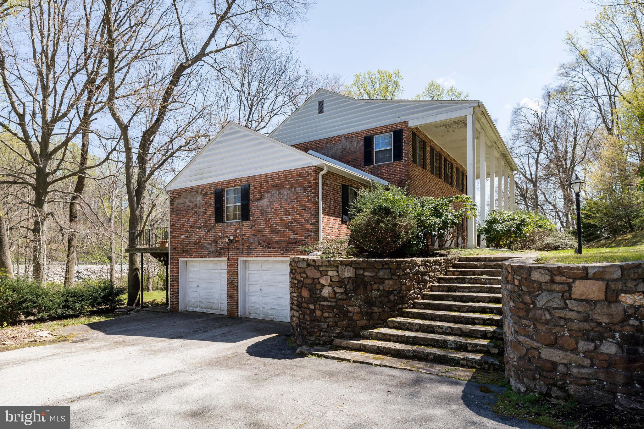 108 Township Line Road Exton, PA 19341 - Photo 60 of 60 Impressive real stone retaining wall and walkway