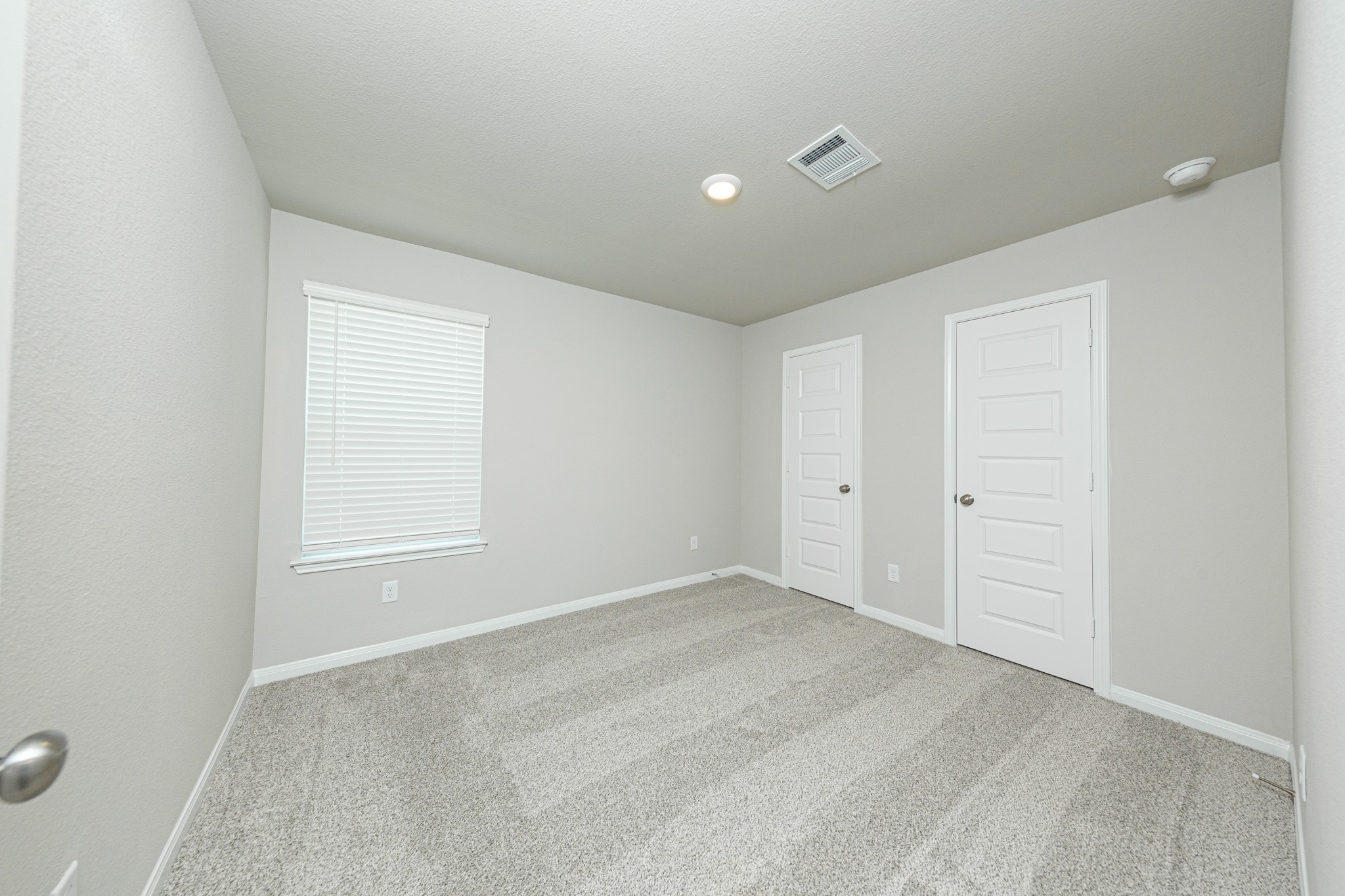 13654 Kit Run Splendora, TX 77372 - Photo 12 of 24 a view of an empty room with a window
