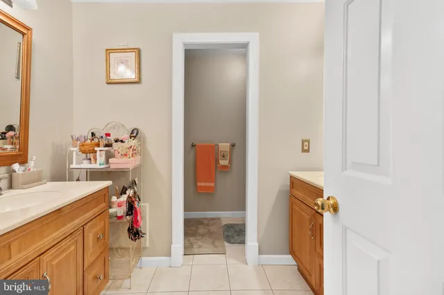 a dining room with a table and chairs