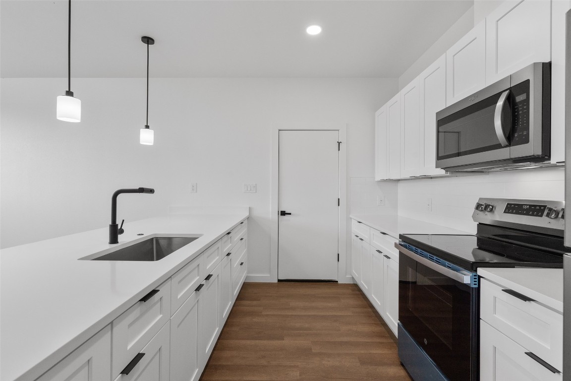 533 Hackberry Road, Unit A & B Salado, TX 76571 - Photo 6 of 17 a kitchen with a sink and steel appliances