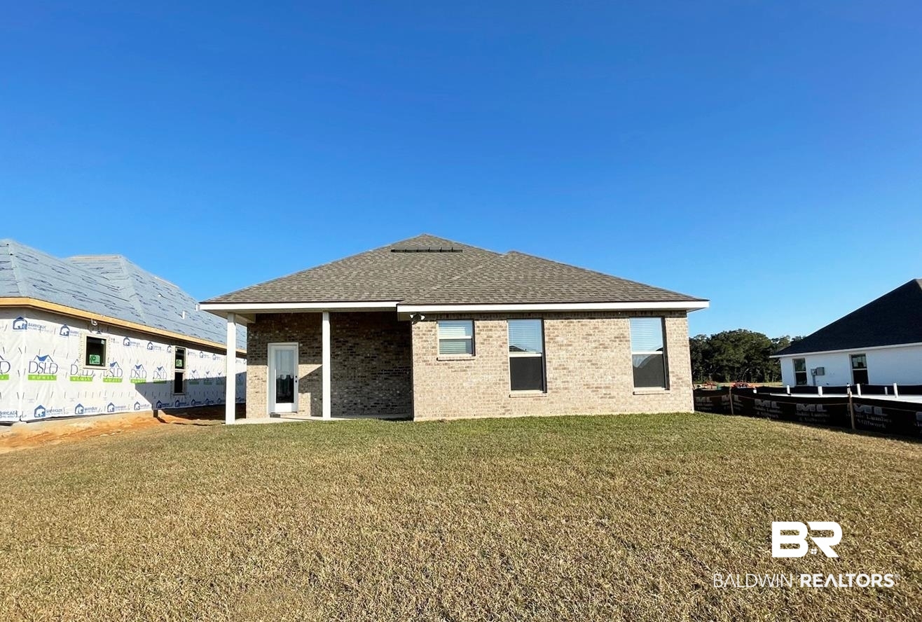1355 Fenton Circle Foley, AL 36535 - Photo 15 of 17 Back of property with a yard