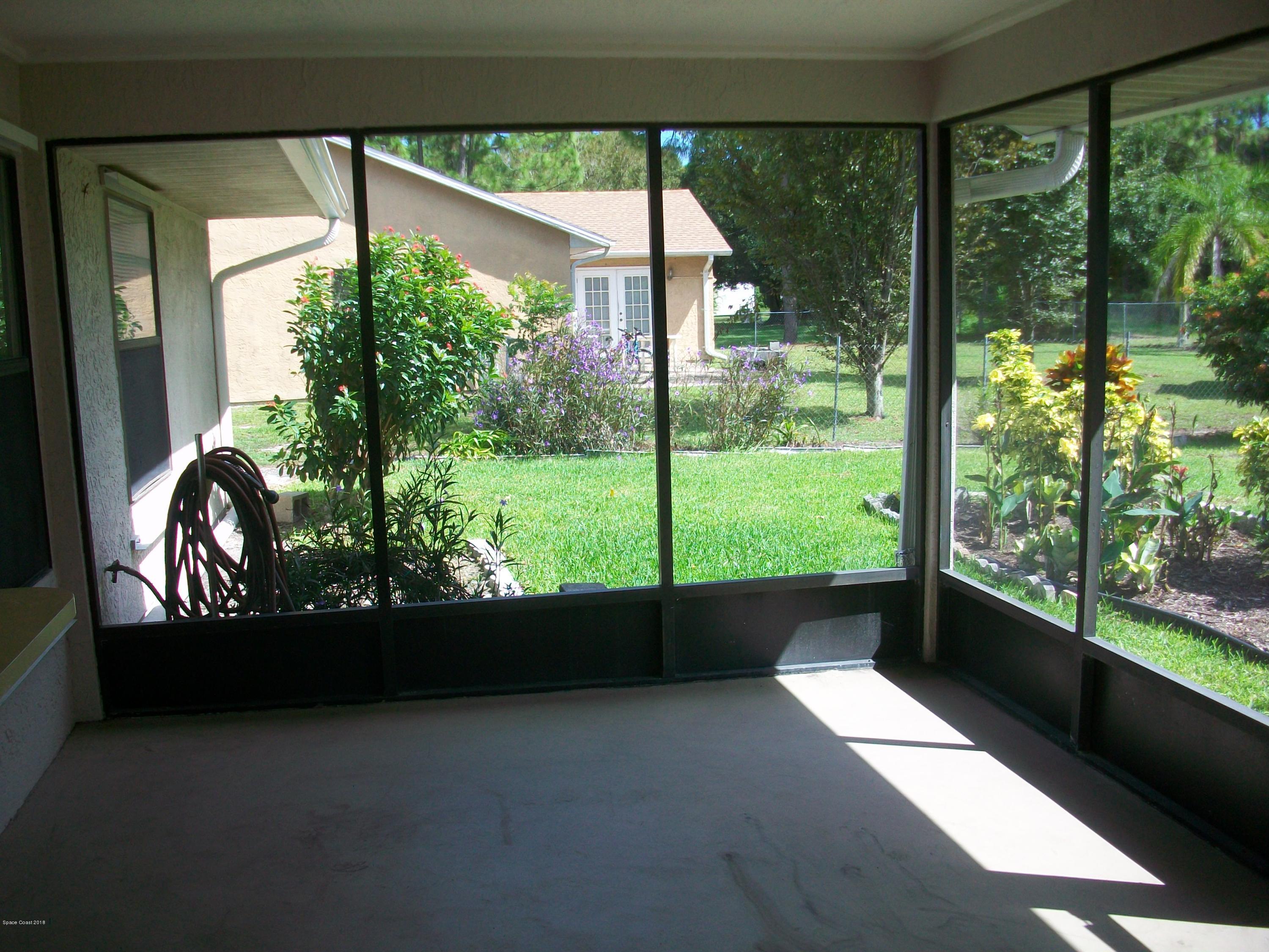 240 Rheine Road Northwest Palm Bay, FL 32907 - Photo 25 of 30 SCREEN PORCH