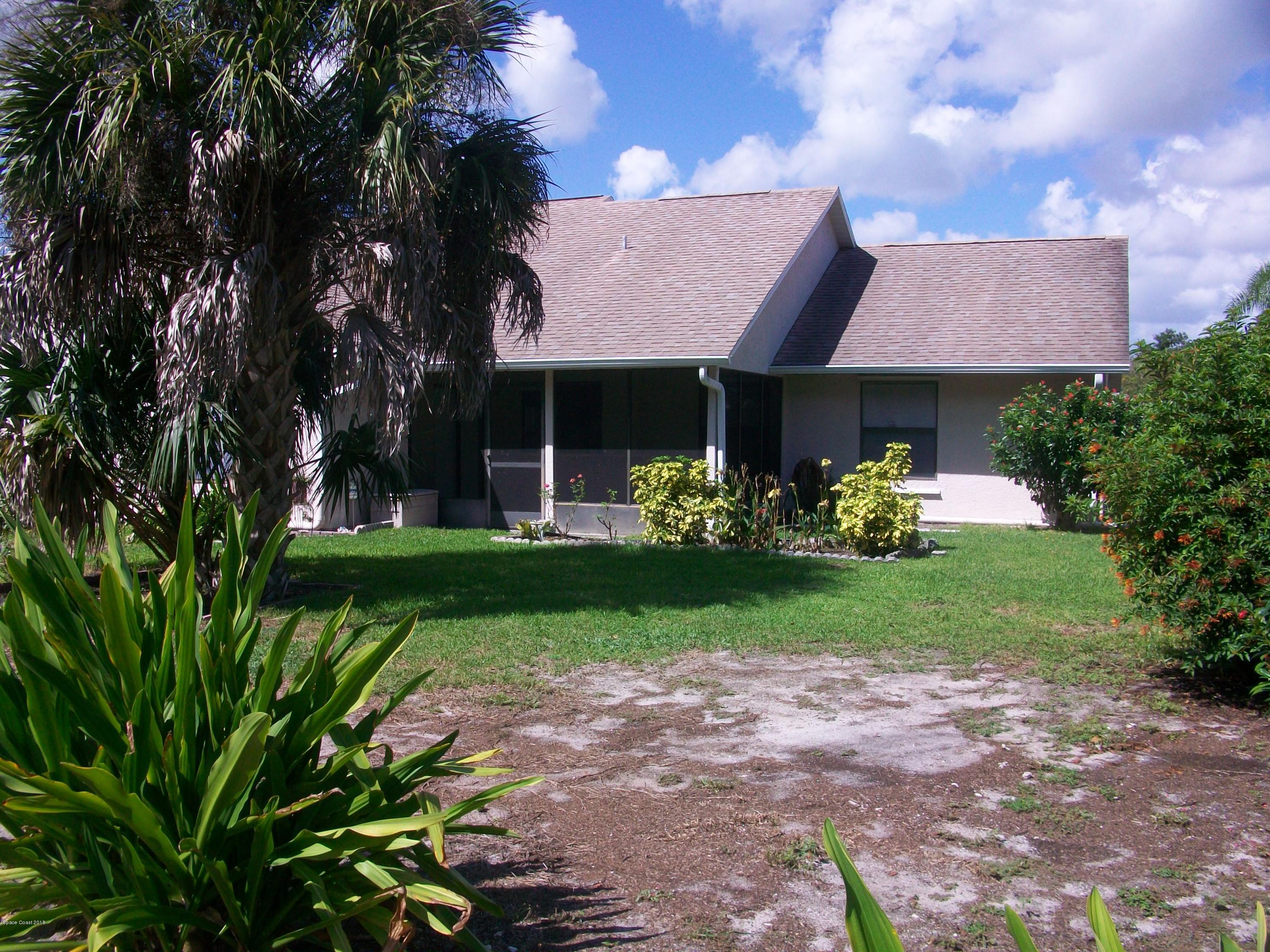 240 Rheine Road Northwest Palm Bay, FL 32907 - Photo 29 of 30 SCREENED TRUSSED PORCH