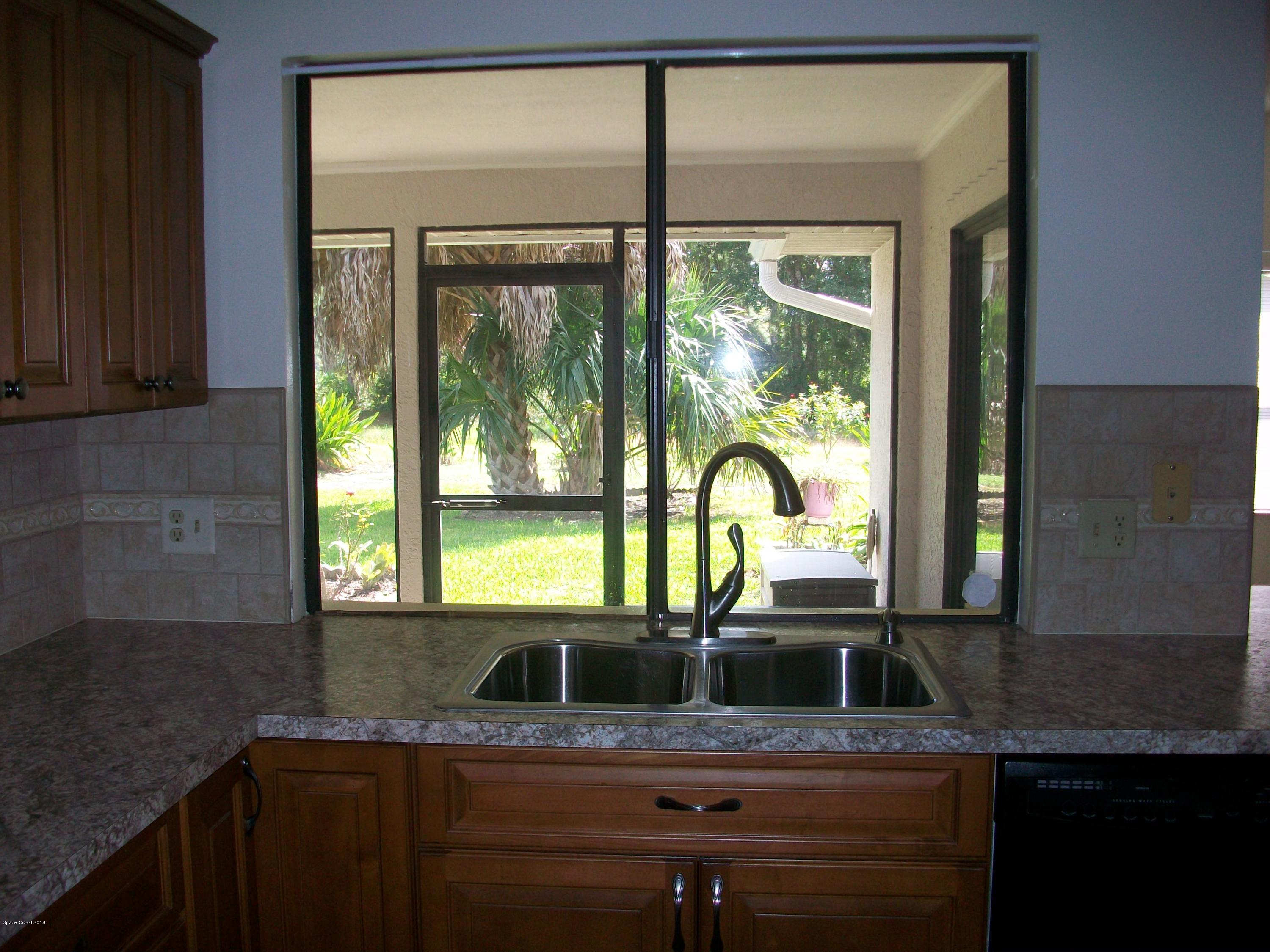 240 Rheine Road Northwest Palm Bay, FL 32907 - Photo 9 of 30 PASS THROUGH