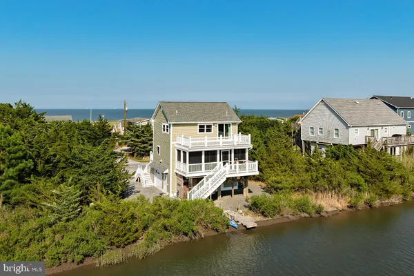 an aerial view of a house with a garden