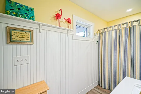 a bedroom with a bed and a table