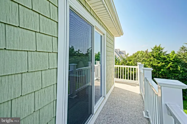 a view of a terrace with a yard