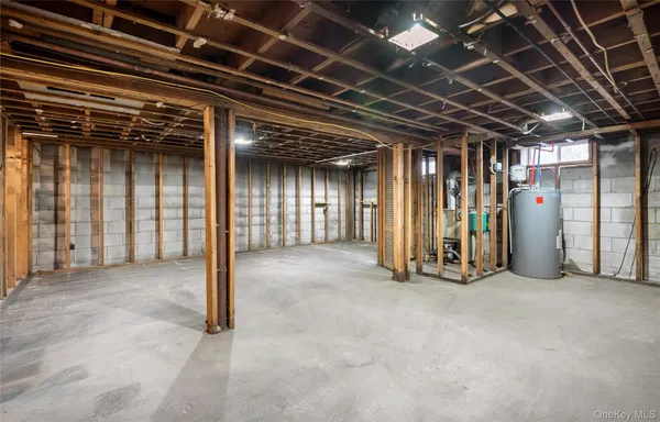 a view of an empty room with closet