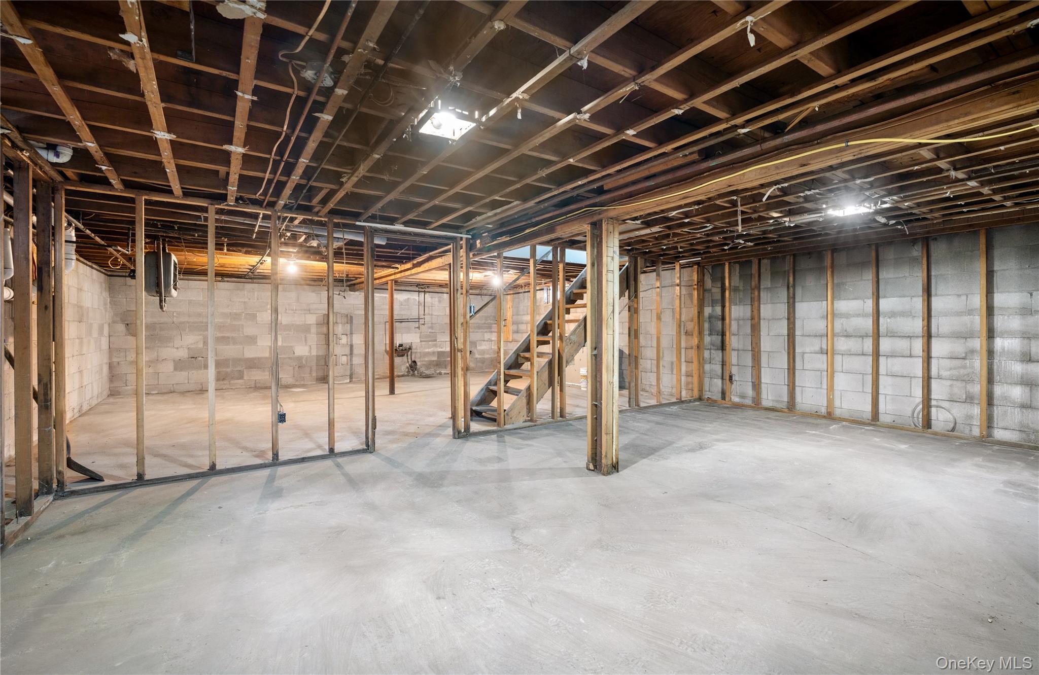48 Hawkins Road Centereach, NY 11720 - Photo 14 of 22 a view of an empty room with wooden walls