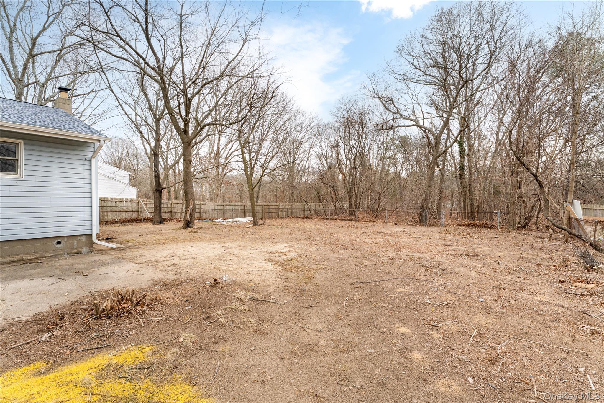48 Hawkins Road Centereach, NY 11720 - Photo 18 of 22 a view of snow on the side of a road