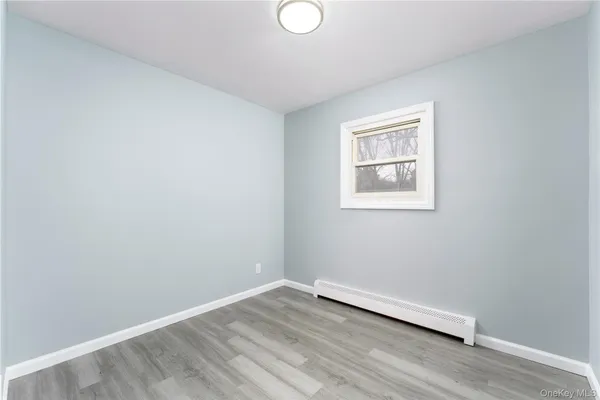 an empty room with a workspace