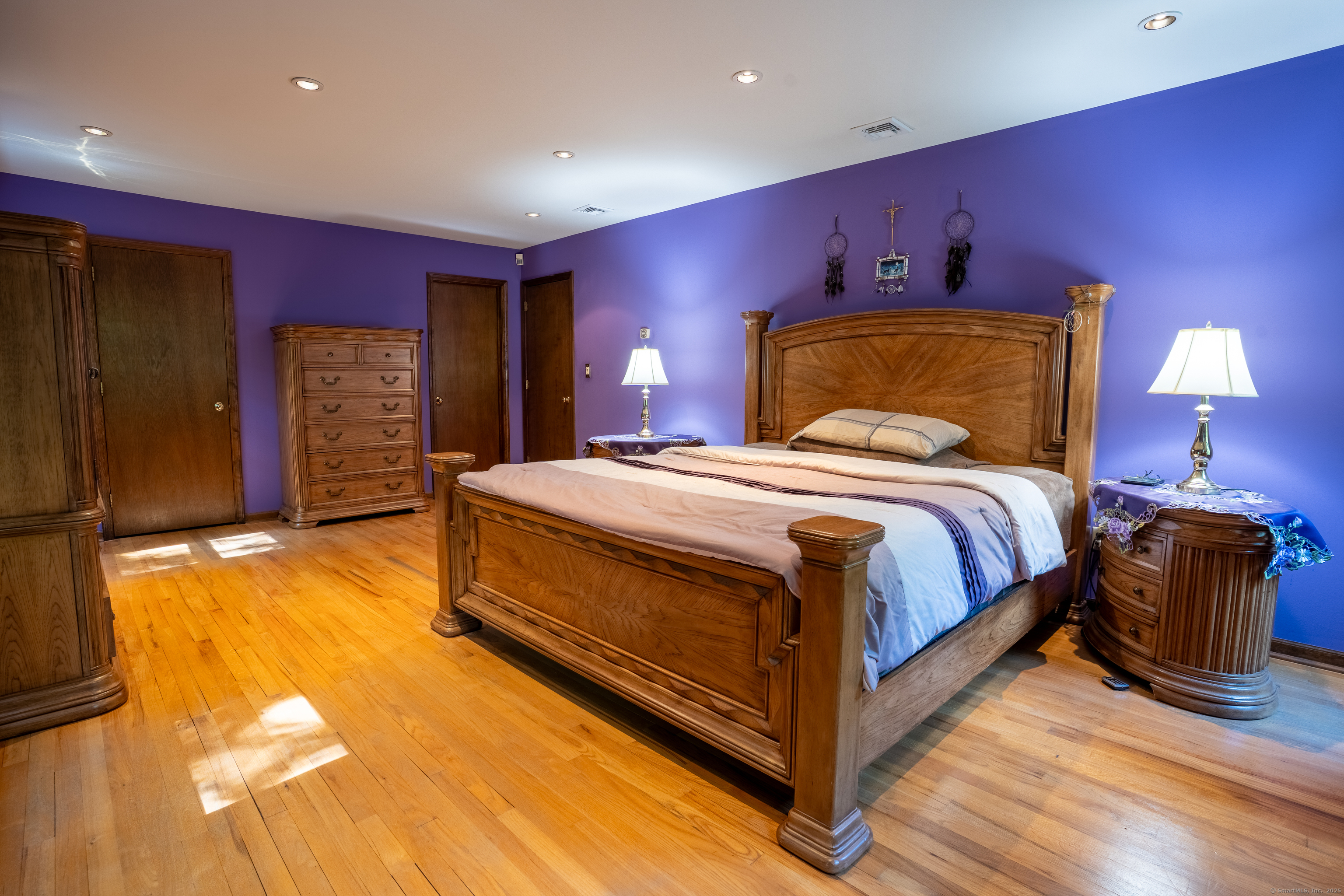 124 Bagburn Hill Road Monroe, CT 06468 - Photo 15 of 34 a bedroom with a bed and wooden floor