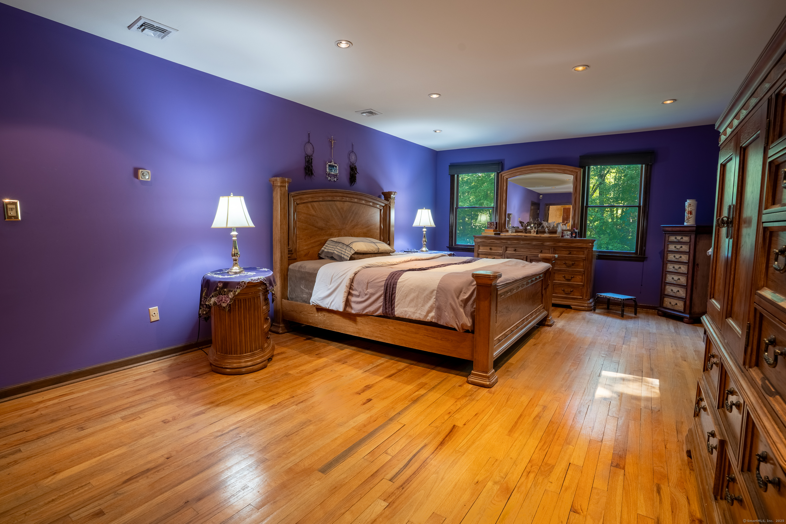 124 Bagburn Hill Road Monroe, CT 06468 - Photo 17 of 34 a bedroom with a bed and a bookshelf