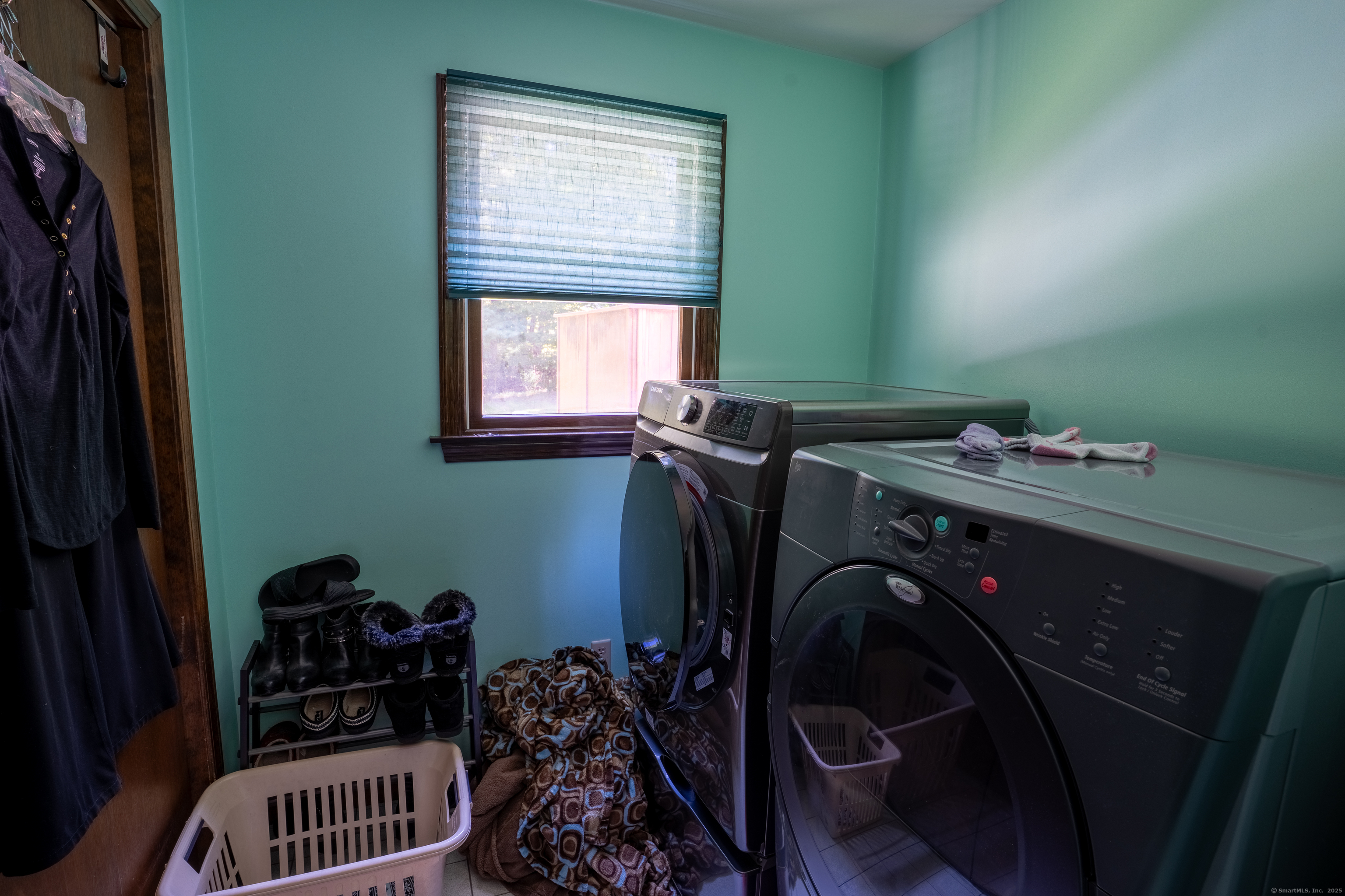 124 Bagburn Hill Road Monroe, CT 06468 - Photo 26 of 34 a utility room with a window dryer and washer