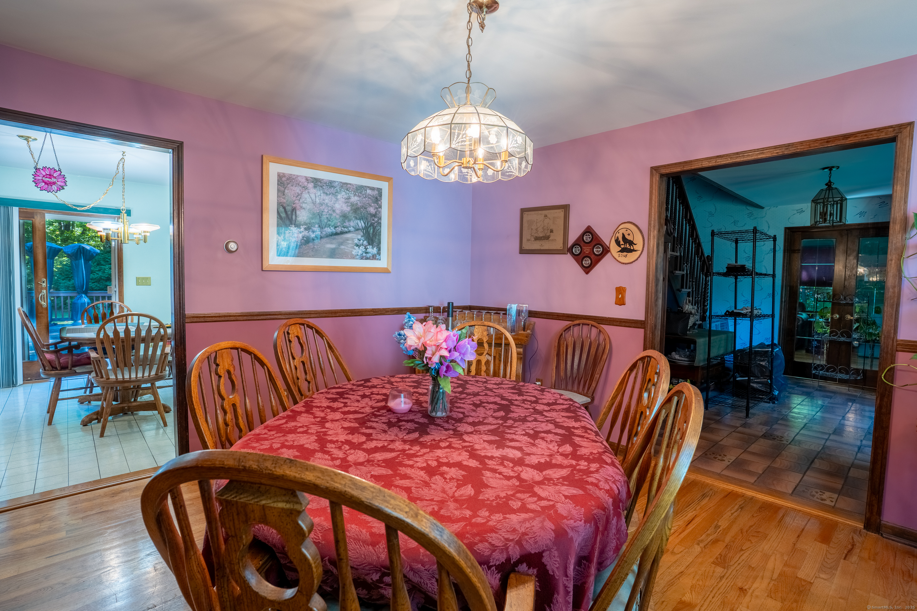 124 Bagburn Hill Road Monroe, CT 06468 - Photo 7 of 34 a dining room with furniture and wooden floor