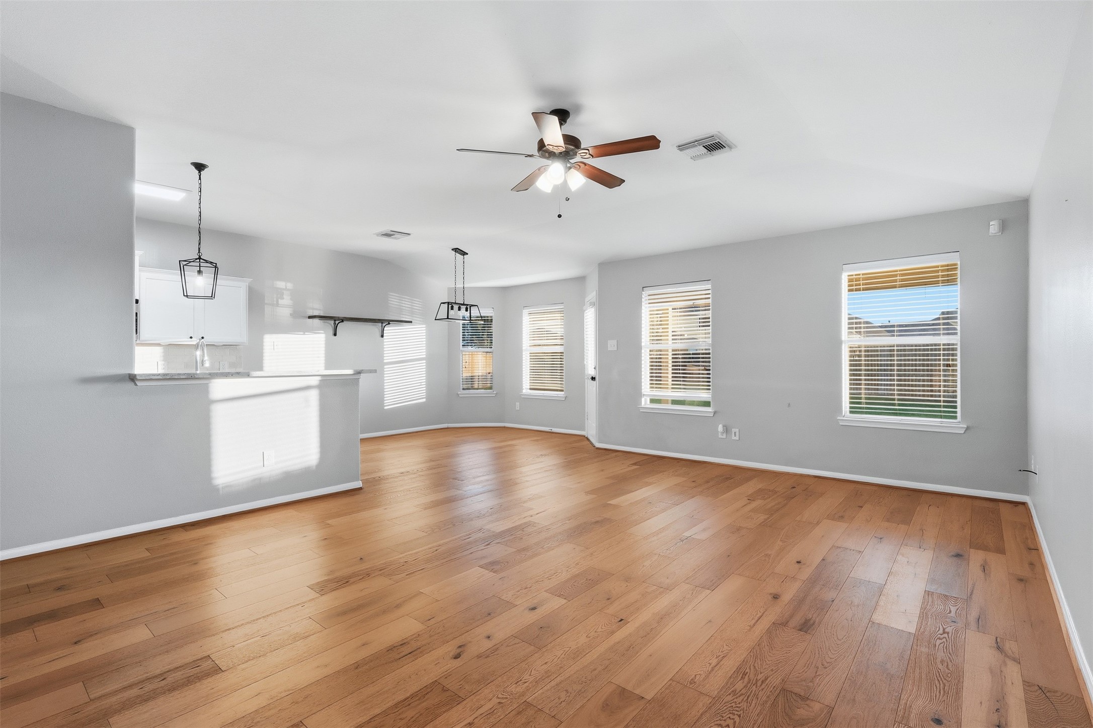 6006 Wilcox Point Drive Spring, TX 77388 - Photo 11 of 30 a view of an empty room with window and wooden floor