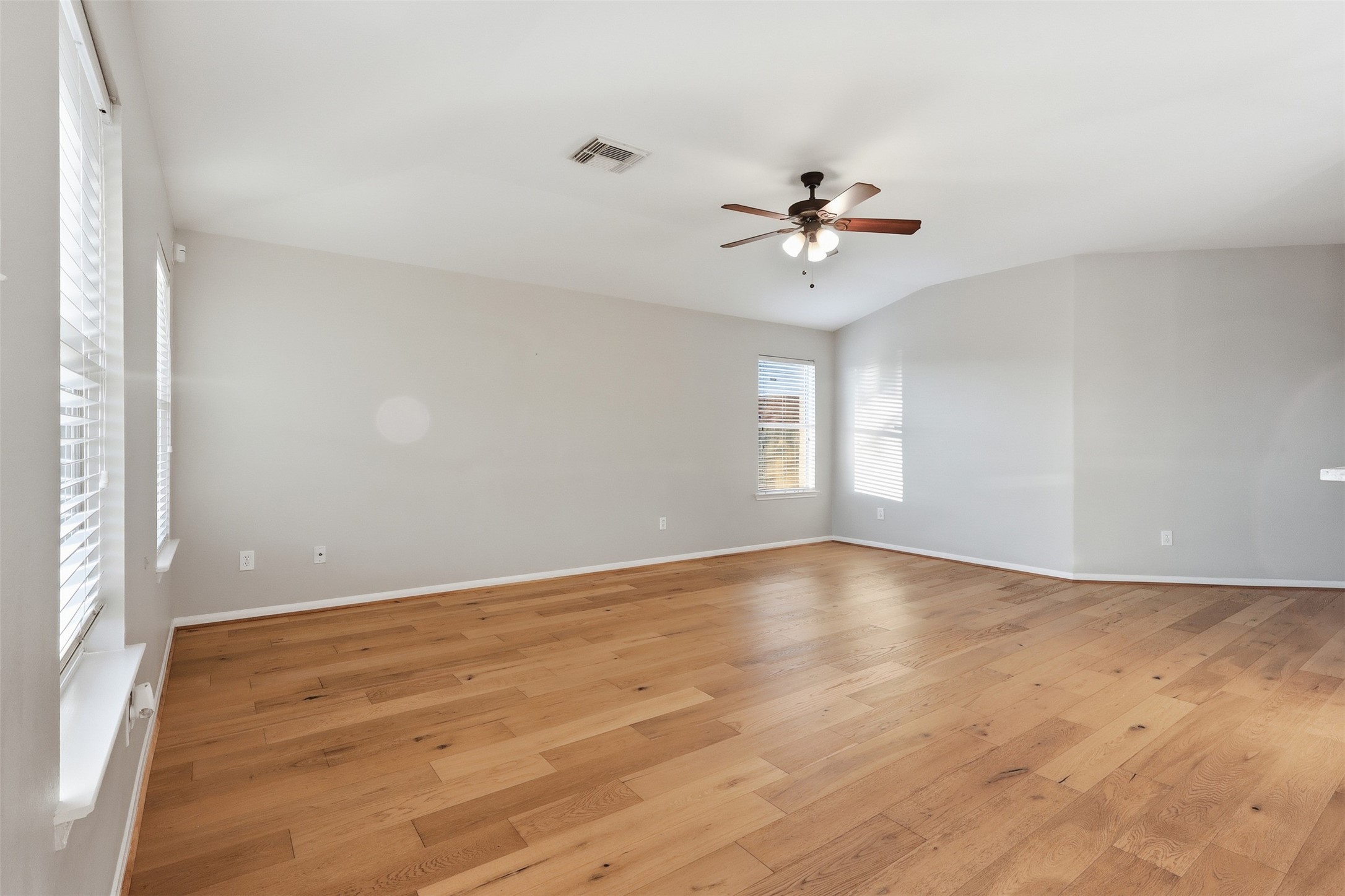6006 Wilcox Point Drive Spring, TX 77388 - Photo 13 of 30 wooden floor in an empty room with a window