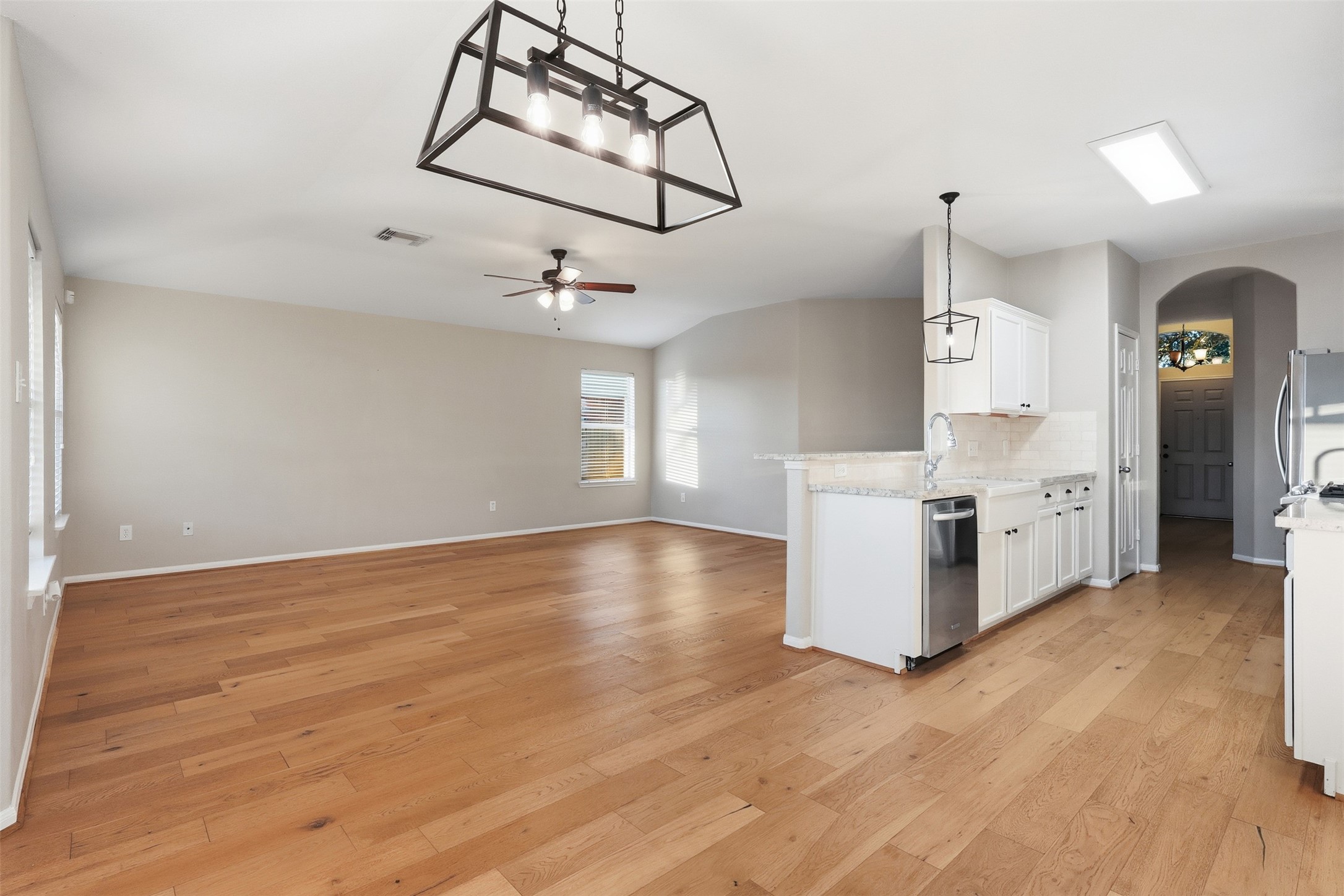 6006 Wilcox Point Drive Spring, TX 77388 - Photo 16 of 30 a view of a kitchen with wooden floor and windows